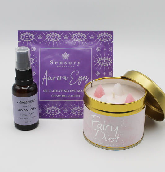 Candle, body oil and an eye mask from the Giving Box